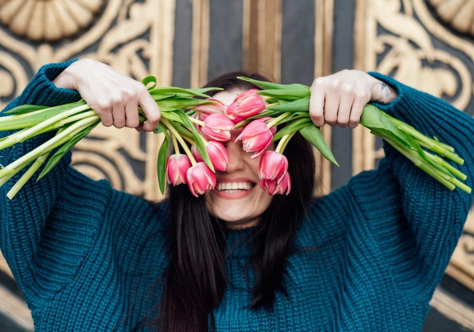 Self-love and self-confidence. Ways to Practice Self-Love and Be Good to Yourself. Surrounding yourself with positivity. Alone woman with flowers enjoy life outdoors.